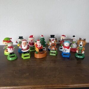 Lot of 13 Dancing Solar Powered Bobble Heads Christmas Santa Snowman Puppy Elf
